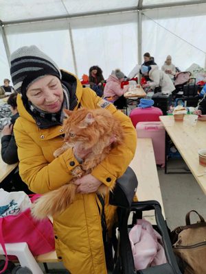 Ukrainian refugee with her pet