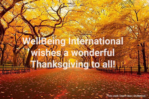 Autumn photo with words overlayed "WellBeing International wishes a wonderful Thanksgiving to all!" | Photo credit: Dream Ideas | Shutterstock