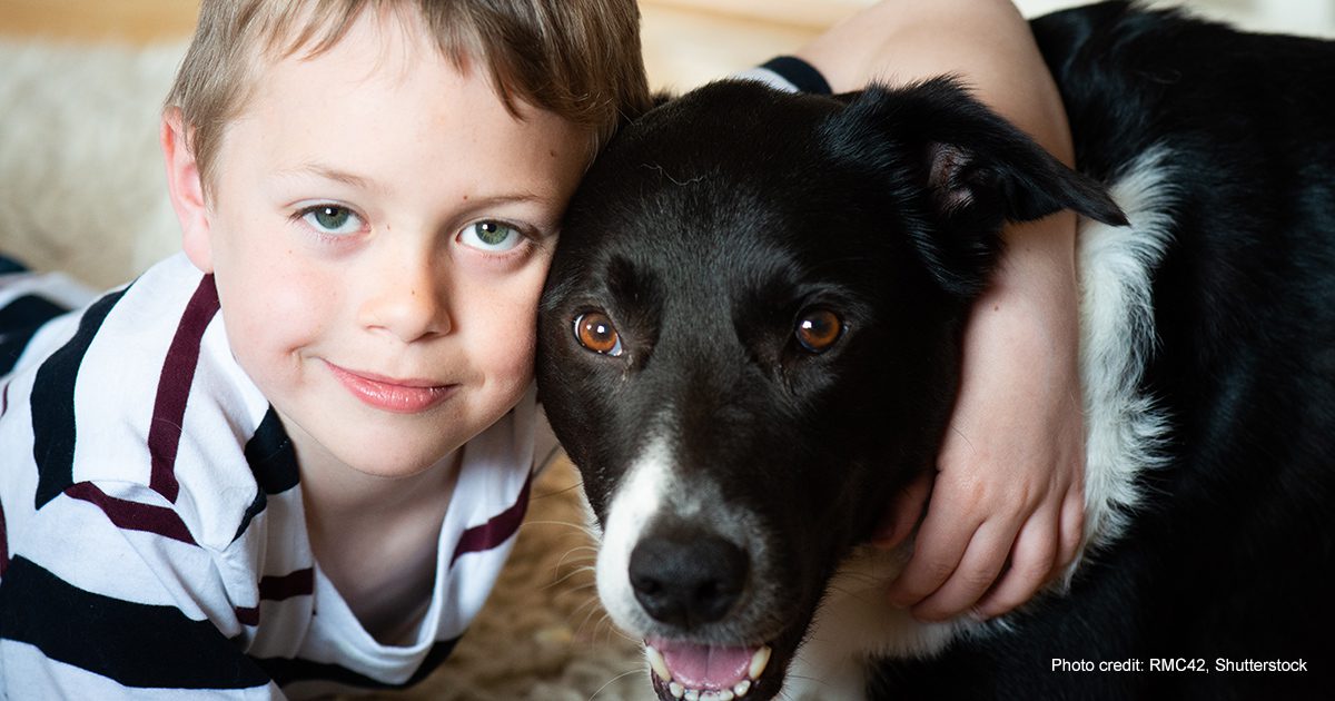 Autistic boy and his dog | Photo credit: RMC42, Shutterstock